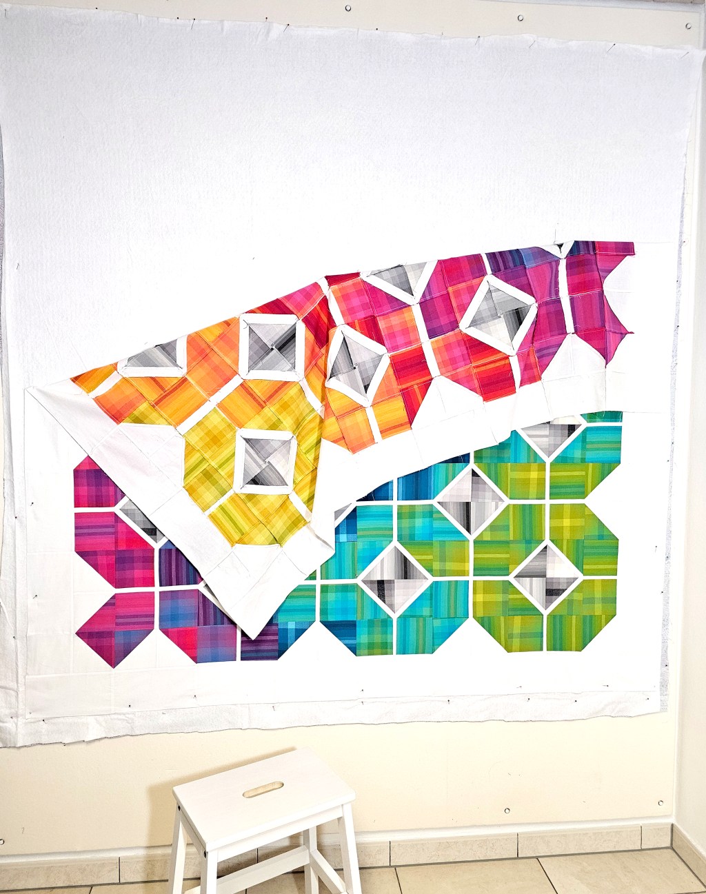 Quilt-Sandwich an Designerwand